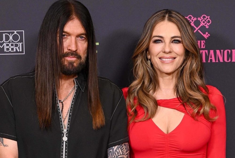 Süßes Geständnis: Billy Ray Cyrus gibt Liz Hurley Gitarrenunterricht