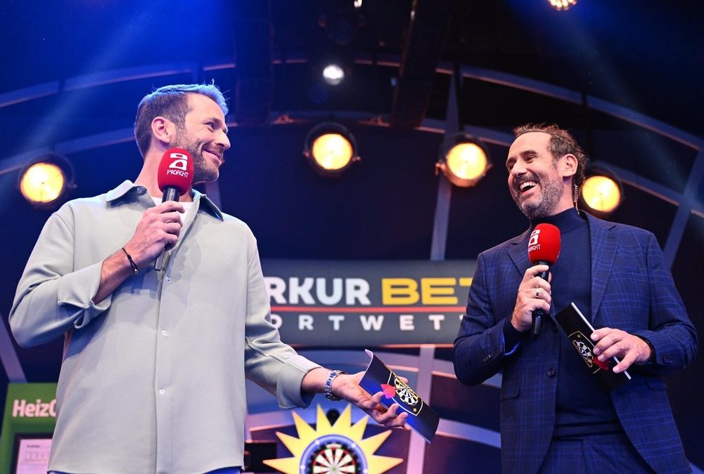 „Die Promi-Darts-WM“ 2026: Calmund und Hummels greifen zum Pfeil